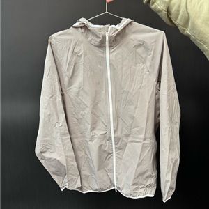 Hooded jacket in paper nylon